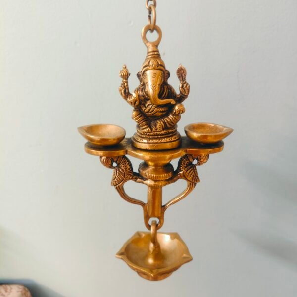 Brass antique finished Nila velakku|Ganesha Hanging Diya with peacock