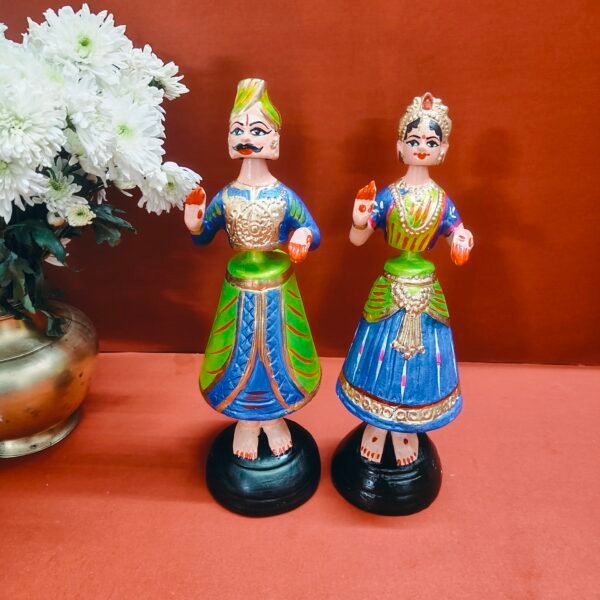 Traditional Thanjavur dancing dolls/ Thanjavur Thalaiyatti Bommai, are bobblehead or roly-poly toys made of terracotta material (Clay)